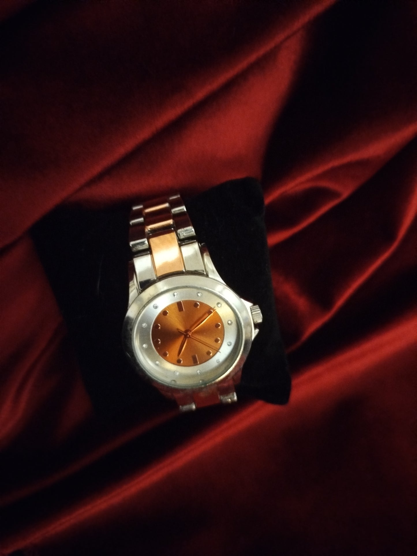 Montre femme de seconde main orange et silver .
