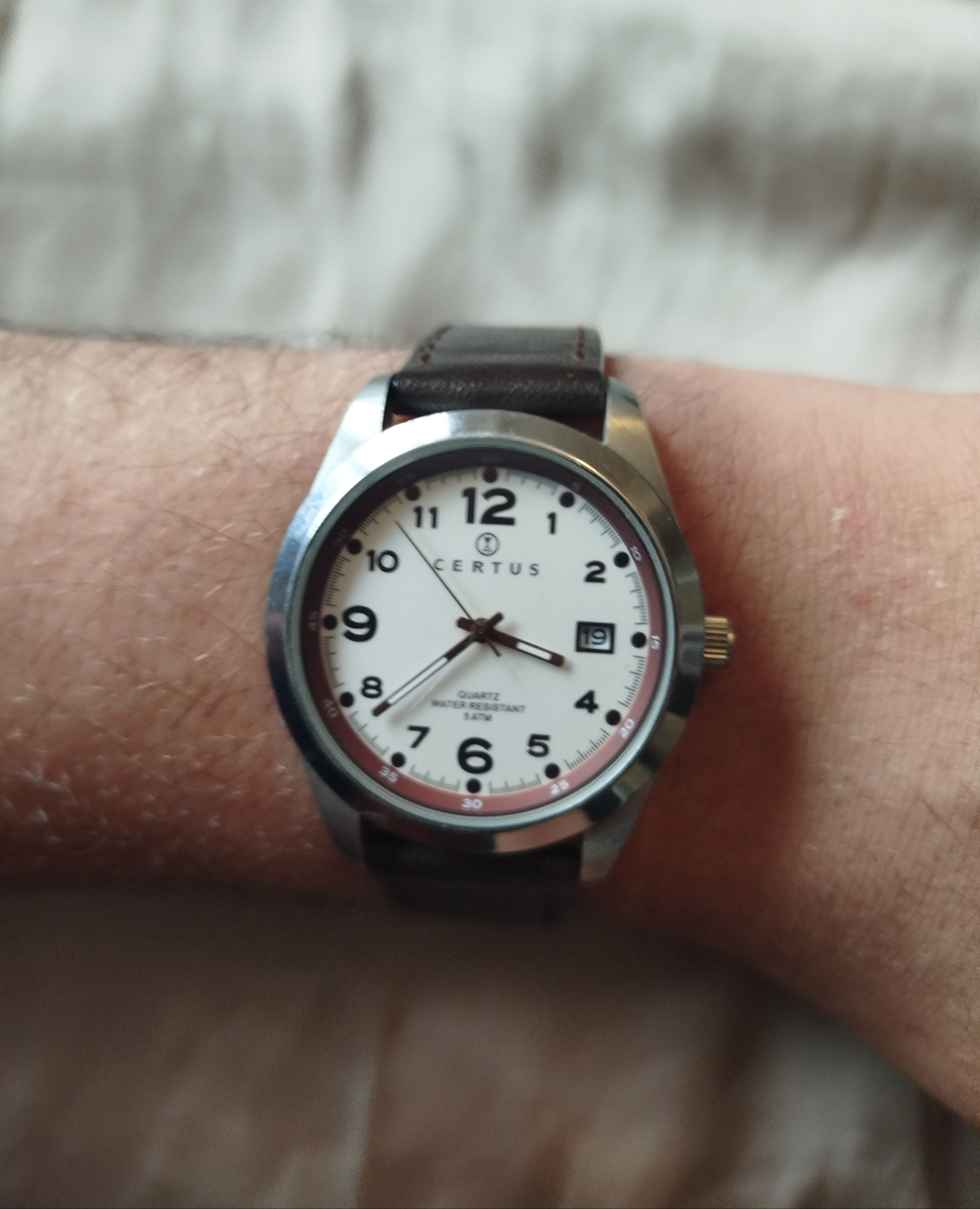 Montre certus homme de seconde main , bracelet cuir d'origine .