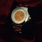 Montre femme orange et silver de seconde main