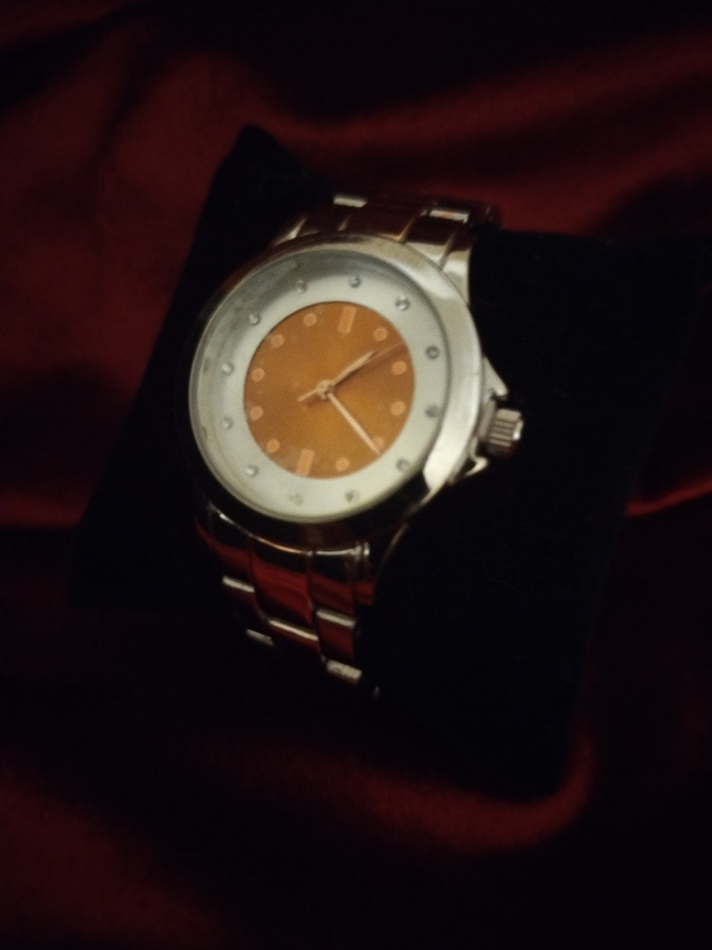 Montre femme orange et silver de seconde main