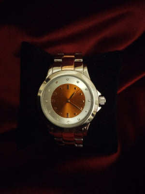 Montre femme orange et silver de seconde main