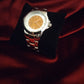 Montre femme orange et silver de seconde main
