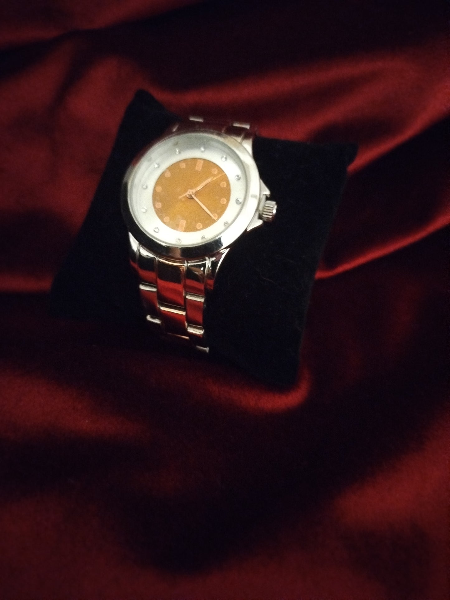 Montre femme orange et silver de seconde main
