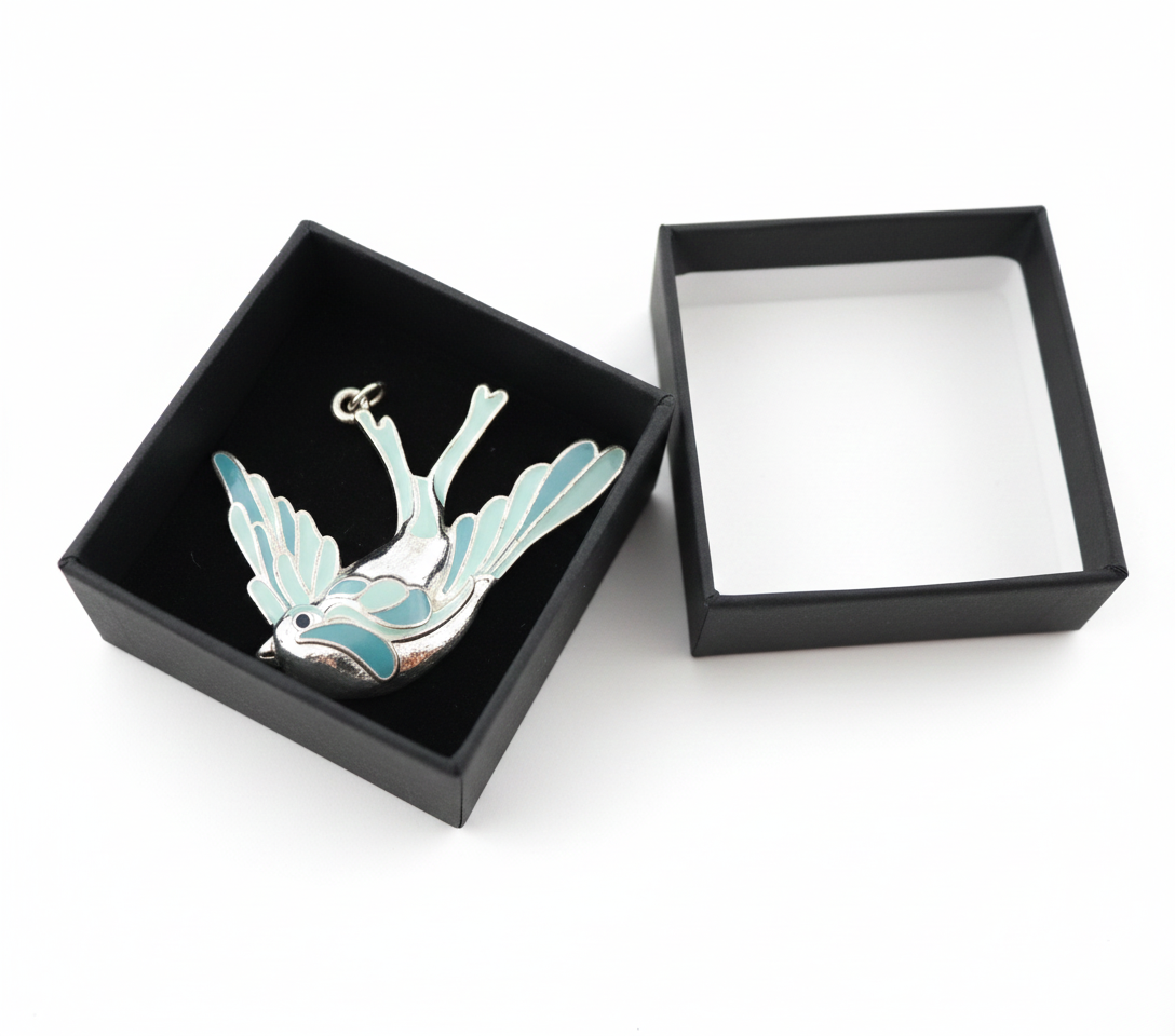 Pendentif oiseau turquoise 