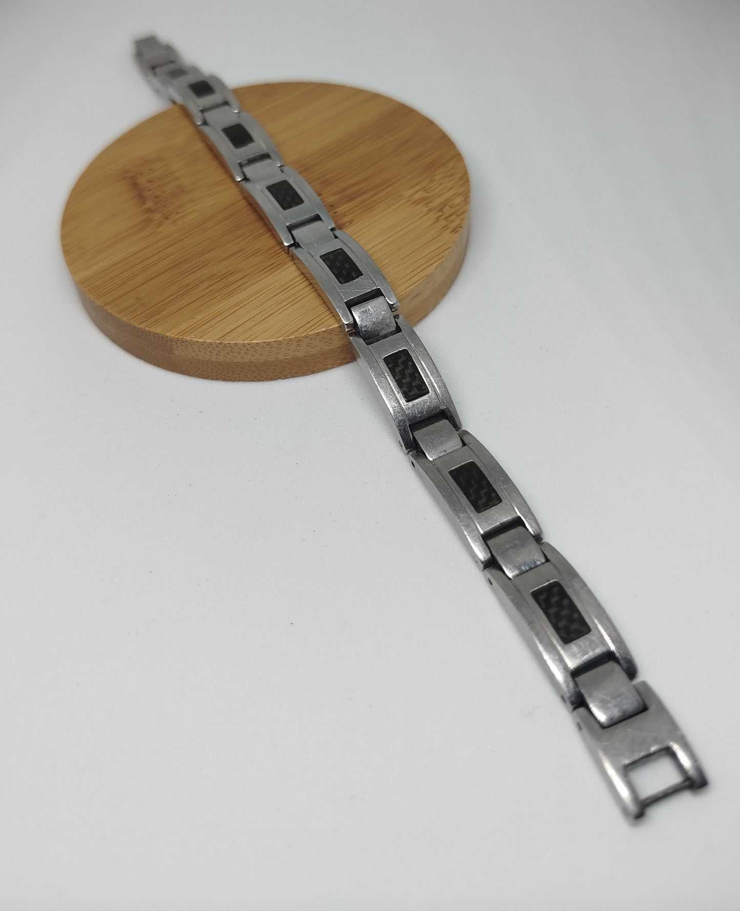 Gourmette seconde main  noir motif fibre de carbone et acier inoxydable | Design and Company