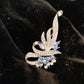 Broche turquoise