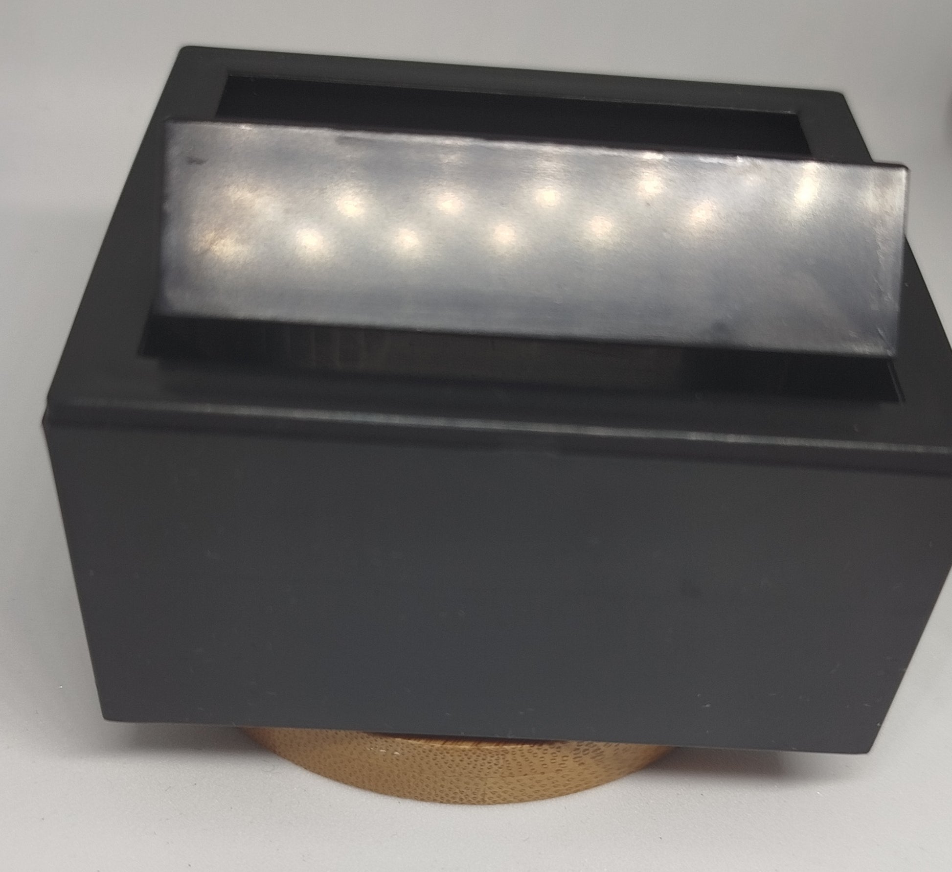 Boîte de rangement pour boutons de manchettes 