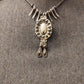 Collier fantaisie griffe et ovalie