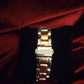 Montre femme de seconde main orange et silver .