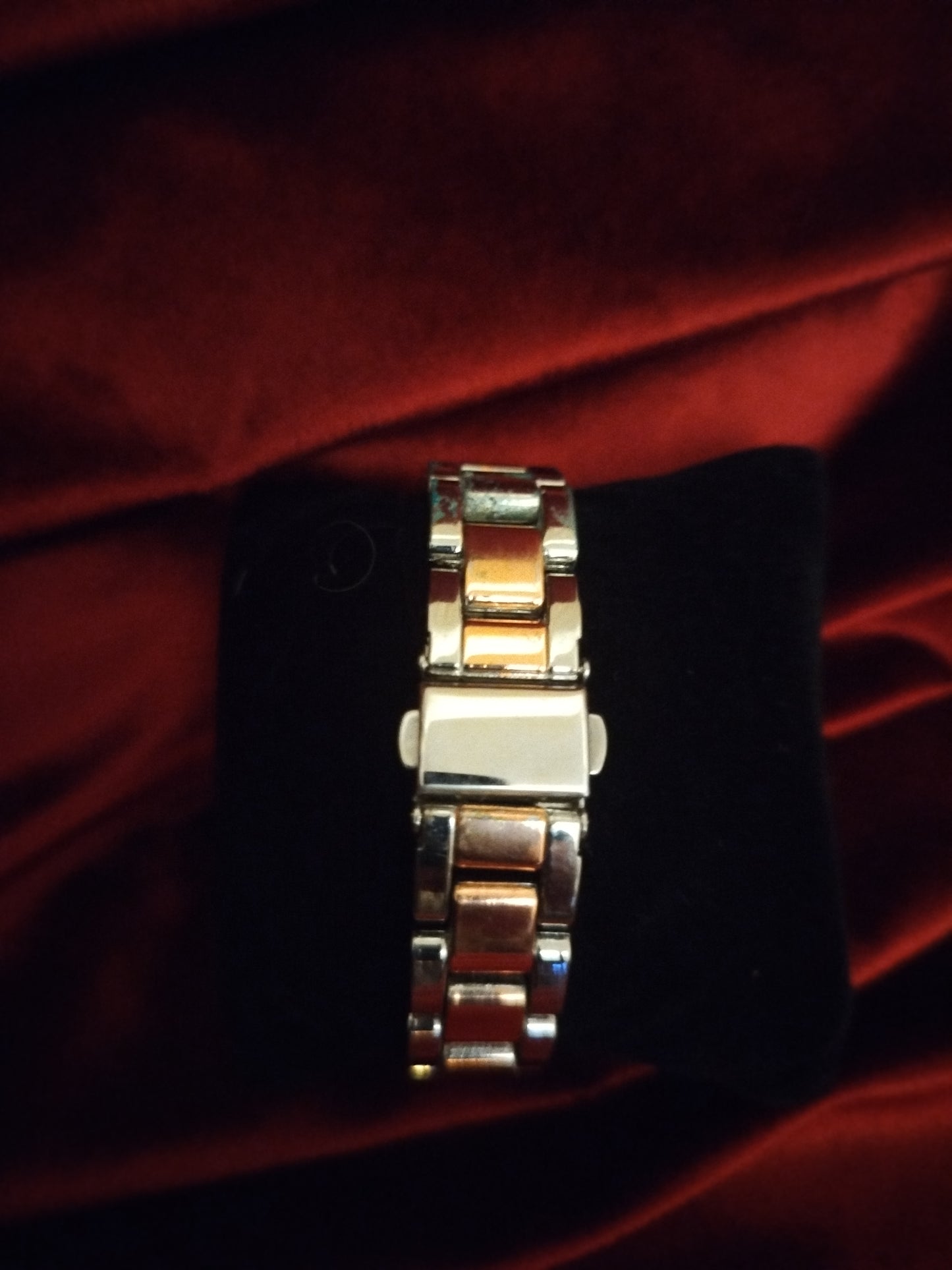 Montre femme de seconde main orange et silver .