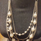 Collier fantaisie perlé sur cinq niveau