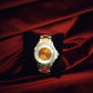 Montre femme de seconde main orange et silver .