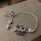 Collier artisanal gris .