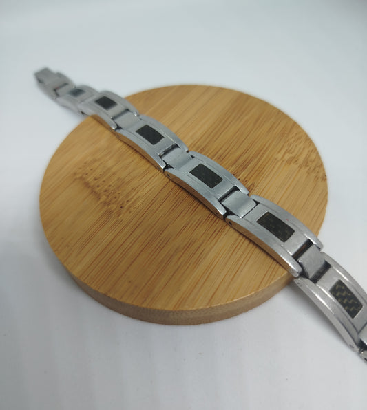 Gourmette seconde main  noir motif fibre de carbone et acier inoxydable | Design and Company